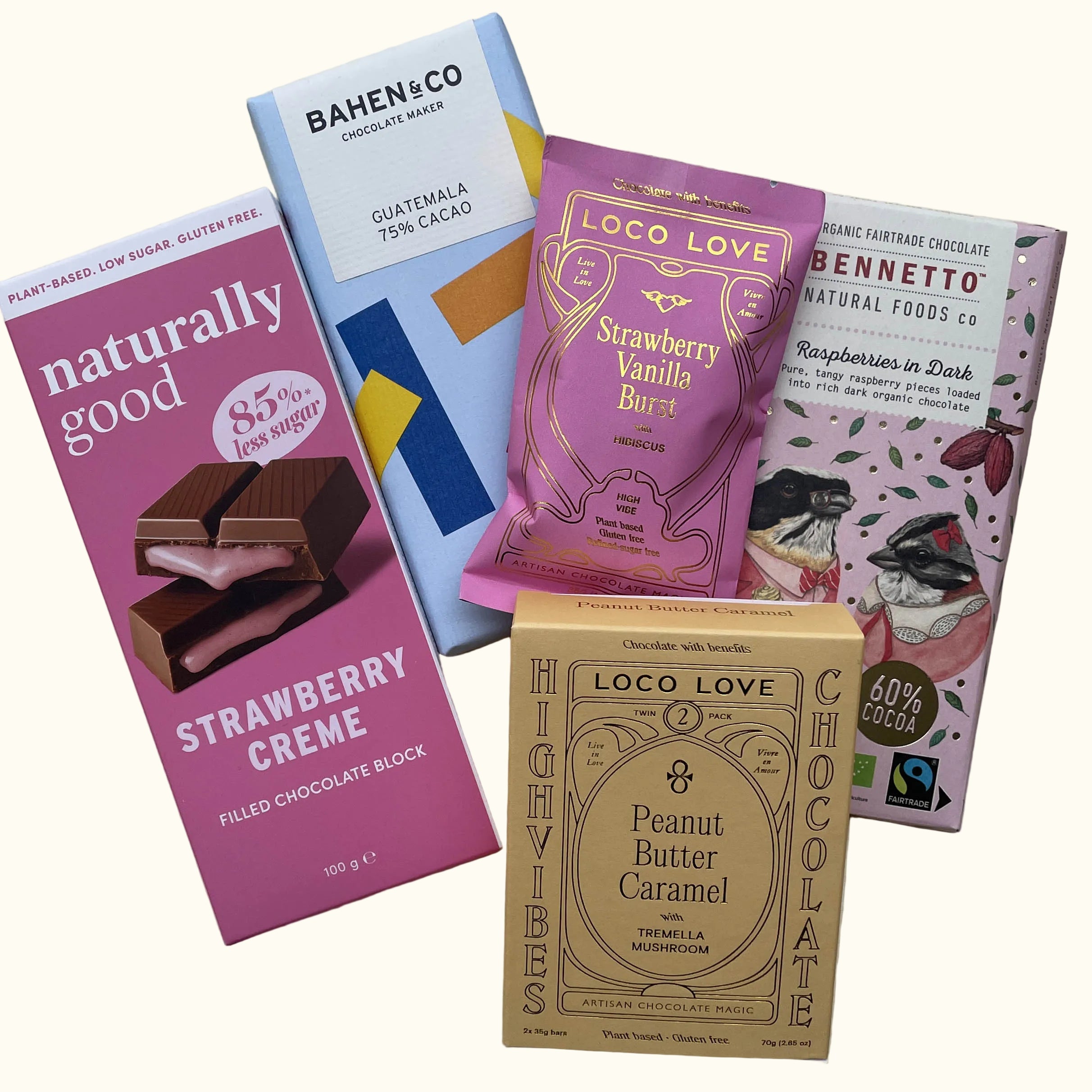  'BAHEN & CO' Guatemala 75% Cacao, a purple wrapper labeled 'LOCO LOVE' Strawberry Vanilla Bars, a pink wrapper labeled 'BENNETTO' Raspberry in Dark, and a tan wrapper labeled 'LOCO LOVE' Peanut Butter Caramel.