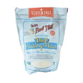 A bag of Bobs Red Mill gluten free 1 to 1 baking flour on a white background.