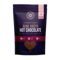 A 196g stand-up pouch of 'Love My Earth' Bone Broth Hot Chocolate, featuring a dark purple and magenta design with a heart-shaped window showing the brown powder inside.