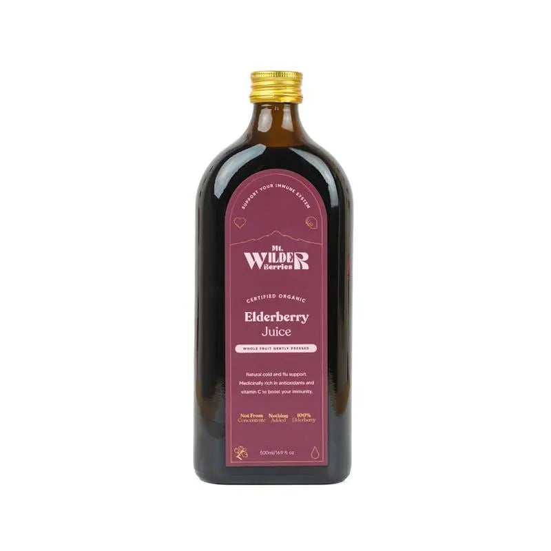 A bottle of Mr. Wilder Organics Elderberry Juice with a dark purple label and a gold cap, shown on a plain white background.