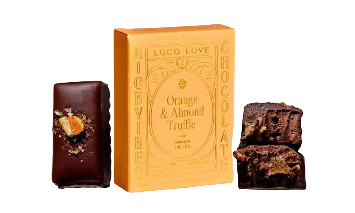 A box of Loco Love Orange & Almond Truffle chocolates on a white background, flanked by a single chocolate piece on the left and two pieces on the right.