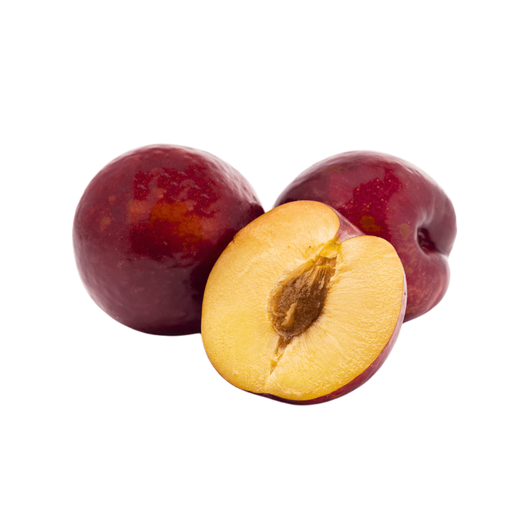 Plum with a half-cut plum showing the interior on a white background