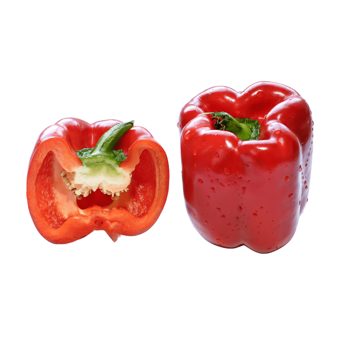 Red capsicum cut in half on a white background