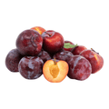 Plums with a halved plum showing the inside on a white background