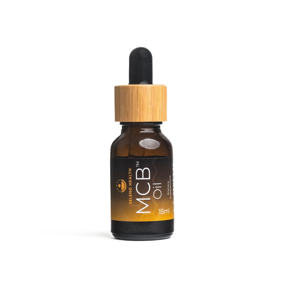 Bottle of MCB oil with a dropper on a white background
