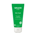 Green tube of Weleda Skin Food on a white background